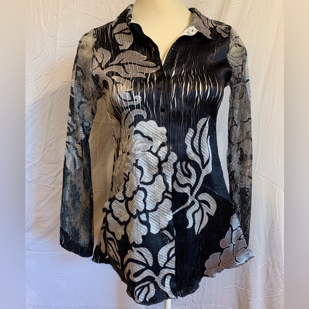 Beautiful vintage, lace and silky top. Corset back.
